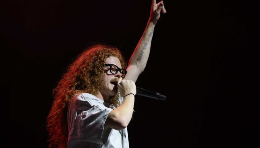 DJ Redlocks performs during the UNK spring concert.