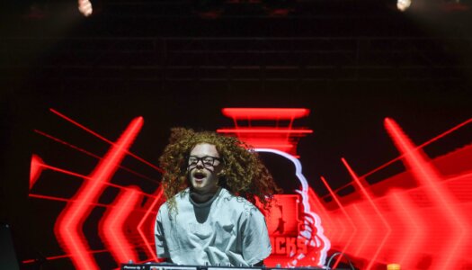 DJ Redlocks performs during the UNK spring concert.