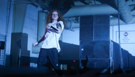 DJ Redlocks performs during the UNK spring concert.