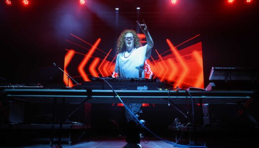 DJ Redlocks performs during the UNK spring concert.