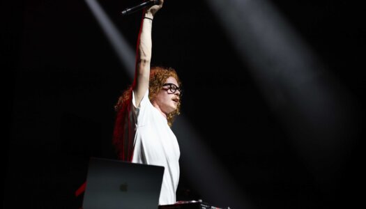 DJ Redlocks performs during the UNK spring concert.