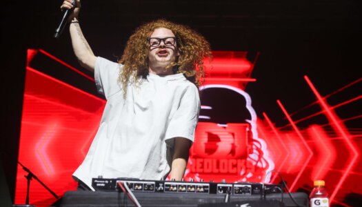 DJ Redlocks performs during the UNK spring concert.