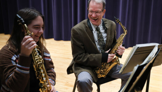 Music professor David Nabb talks with one of his saxophone students during practice (Photo by Erika Pritchard, UNK Communications).