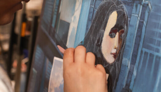 A student draws in the drawing classroom (Photo by Erika Pritchard, UNK Communications).