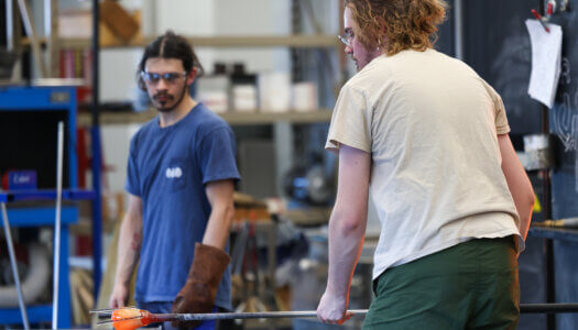 Students create glass pieces in the glassblowing studio (Photo by Erika Pritchard, UNK Communications).