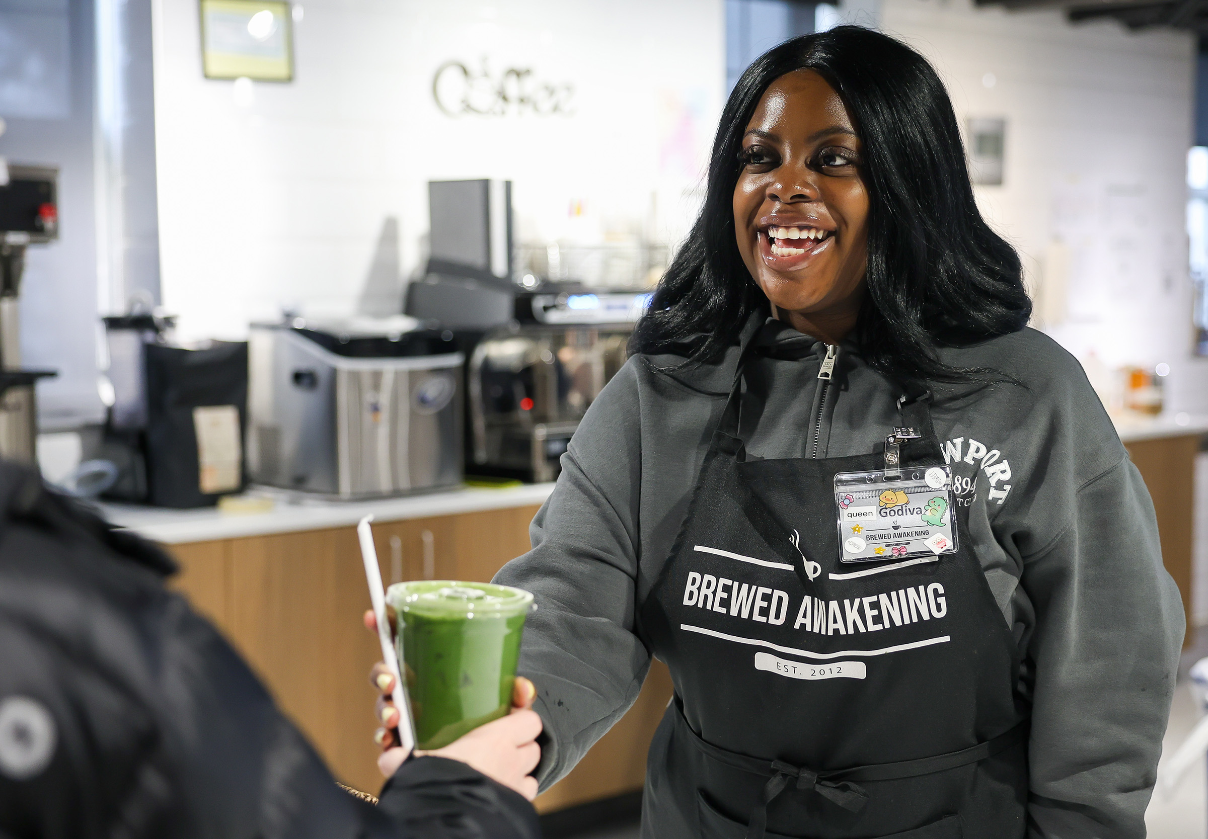 Godiva Kekeh works at the Brewed Awakening student-run coffee shop on campus.