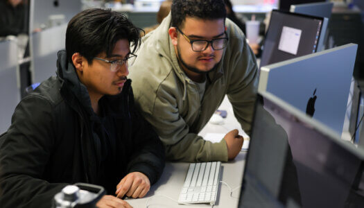Students work on a graphic design in class (Photo by Erika Pritchard, UNK Communications).
