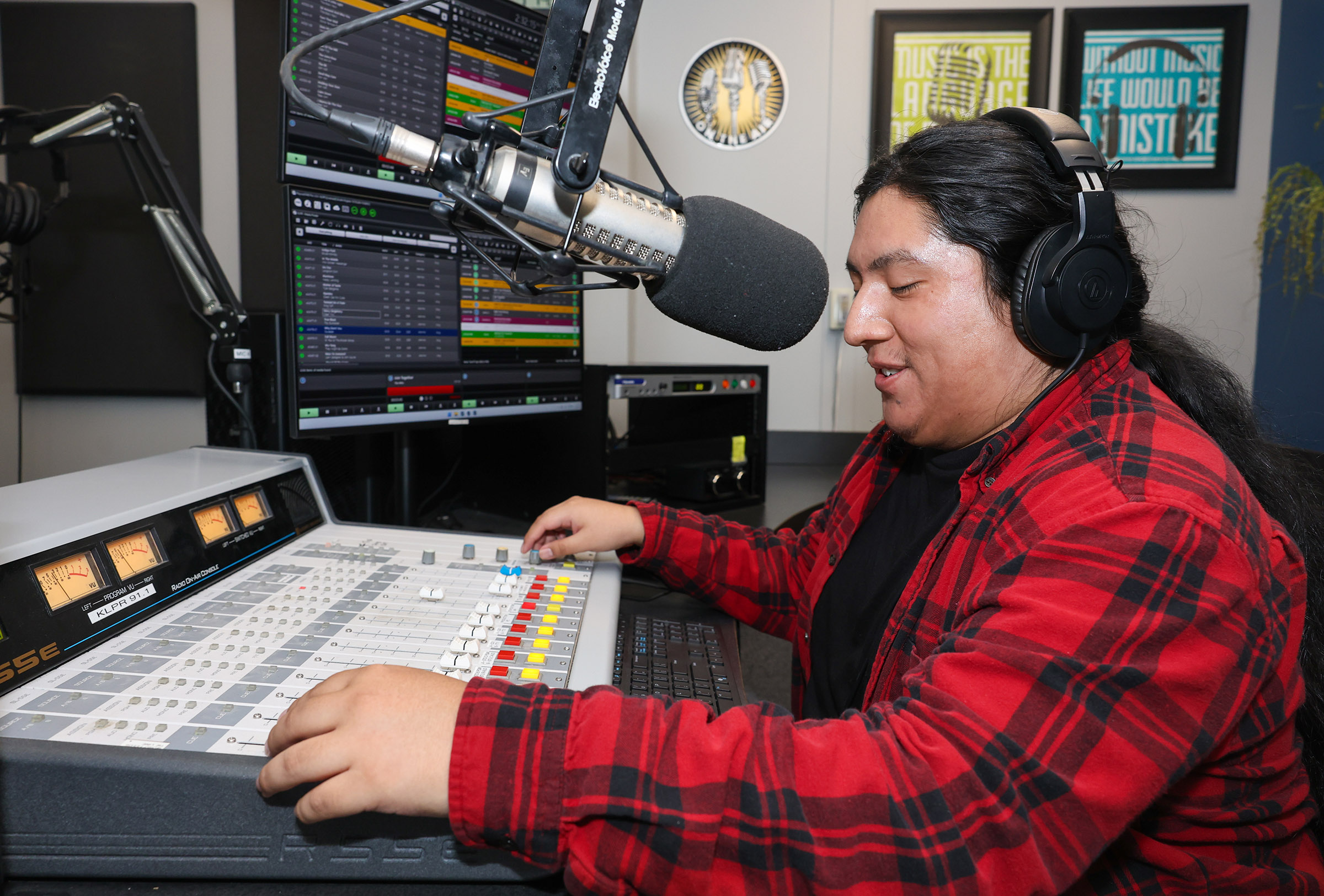 UNK senior Mario Crispin is pictured in the campus radio station.