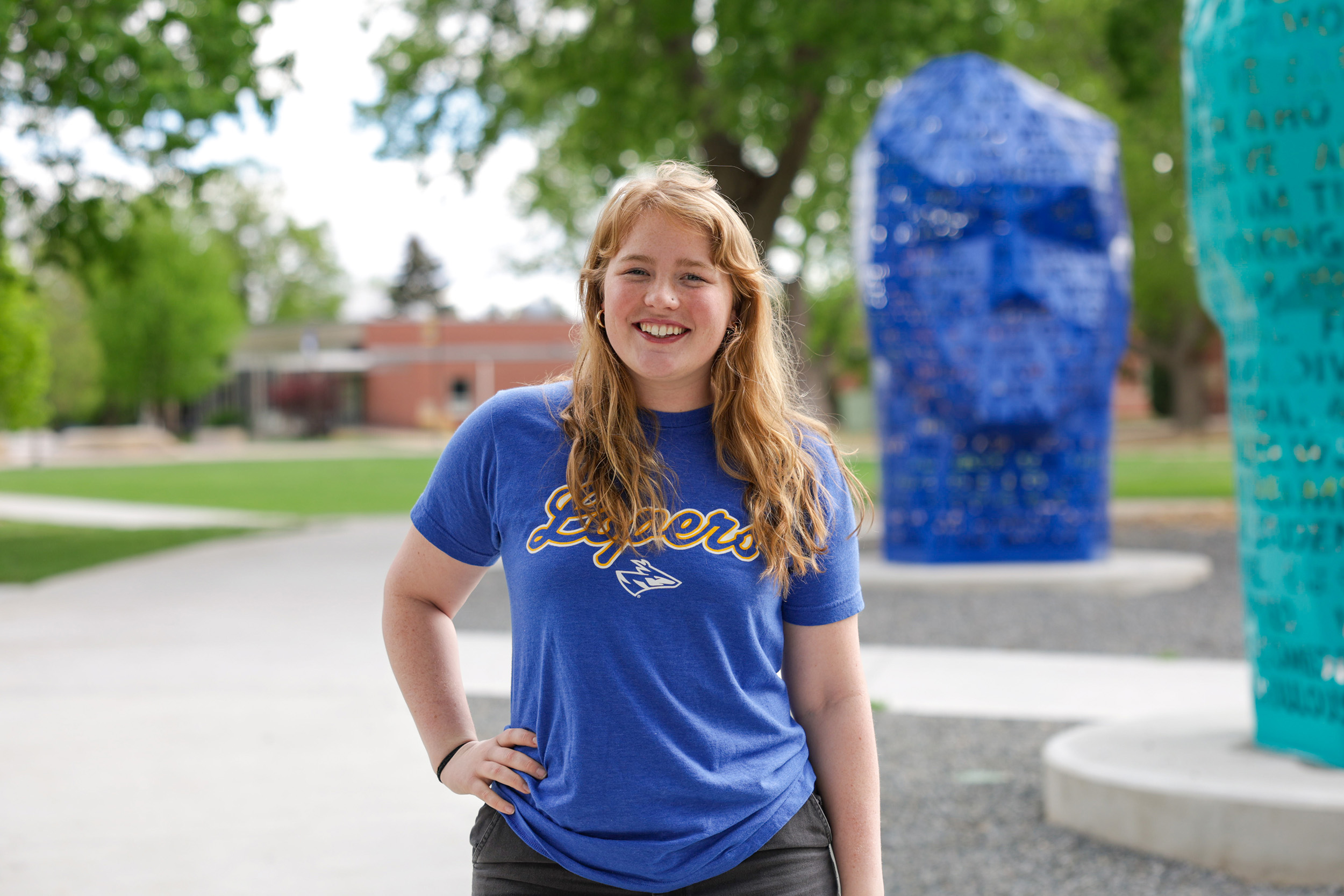 Maggie Wells poses for a photo on the UNK campus.