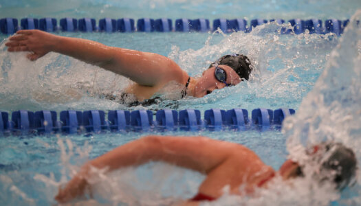Maggie Wells competes for UNK swimming.