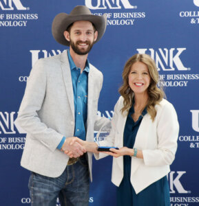 Noah Young receives the Alumni Entrepreneur Award.