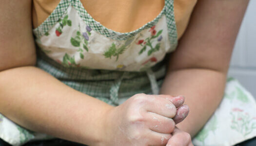A student creates pottery in ceramics class (Photo by Erika Pritchard, UNK Communications).