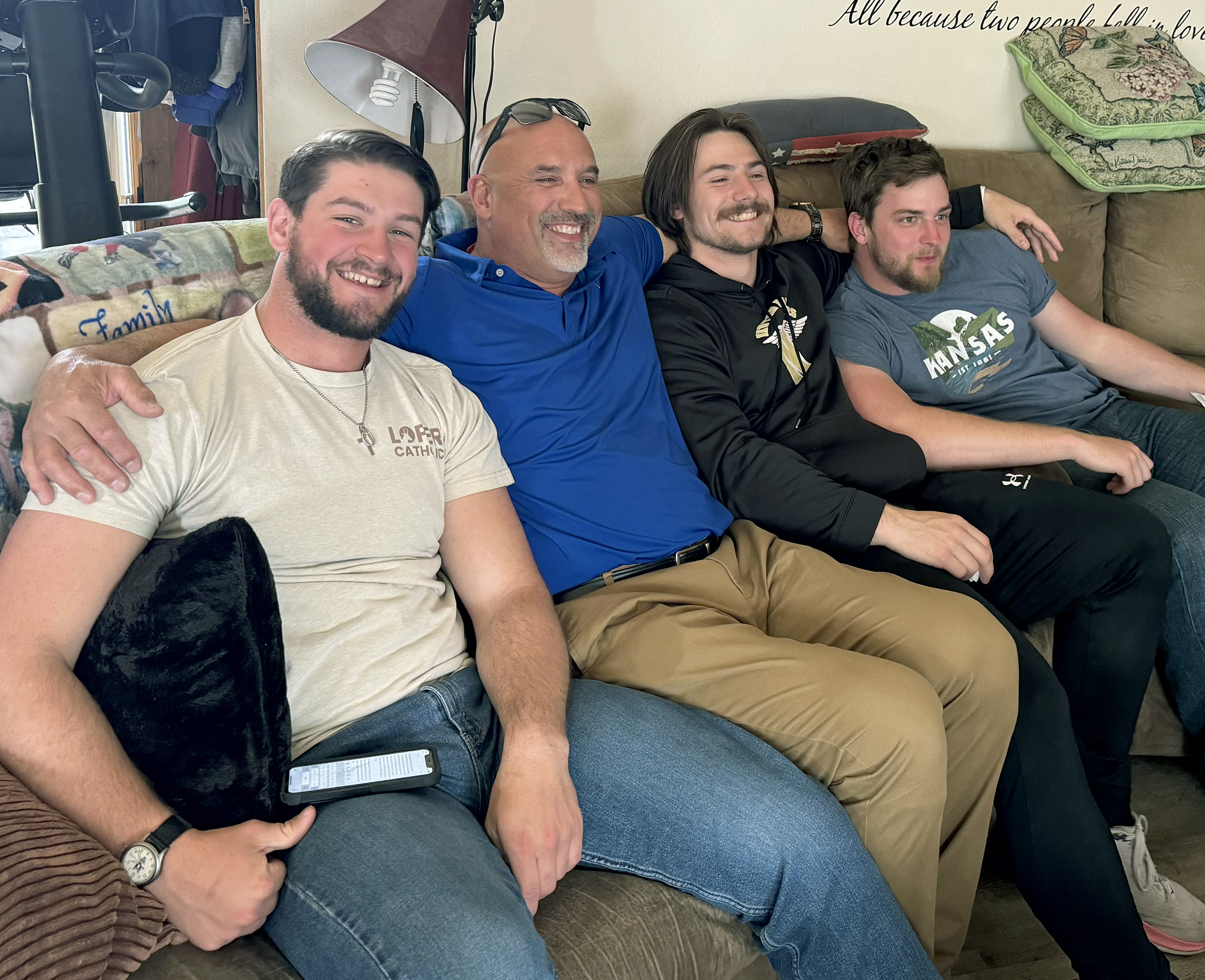 Rylan Basart is pictured with his uncle Darren Grauerholz and former UNK throwers Kenyon Forest and Evan Prohaska.