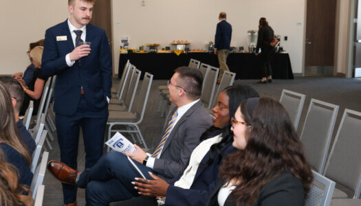 Student Government members mingle before the inauguration ceremony.