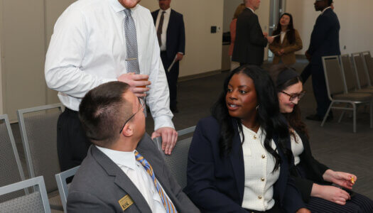 Student Government members mingle before the inauguration ceremony.