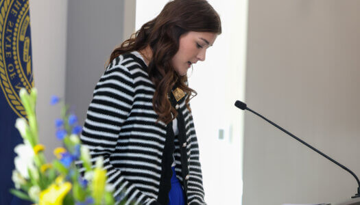 Karleigh North speaks at the podium.