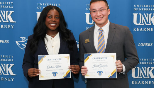 Godiva Kekeh and Josiah Gonzales pose for a photo.