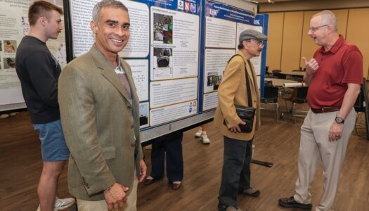 A UNK student presents their research during Student Research and Creative Activity Day.