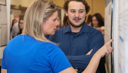 A UNK student presents their research during Student Research and Creative Activity Day.