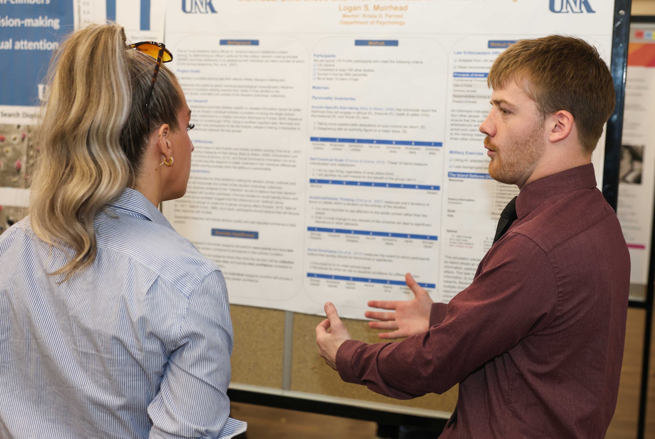 Logan Muirhead discusses his research project.