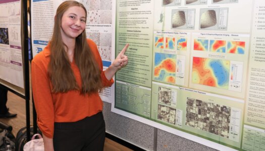 A UNK student presents their research during Student Research and Creative Activity Day.
