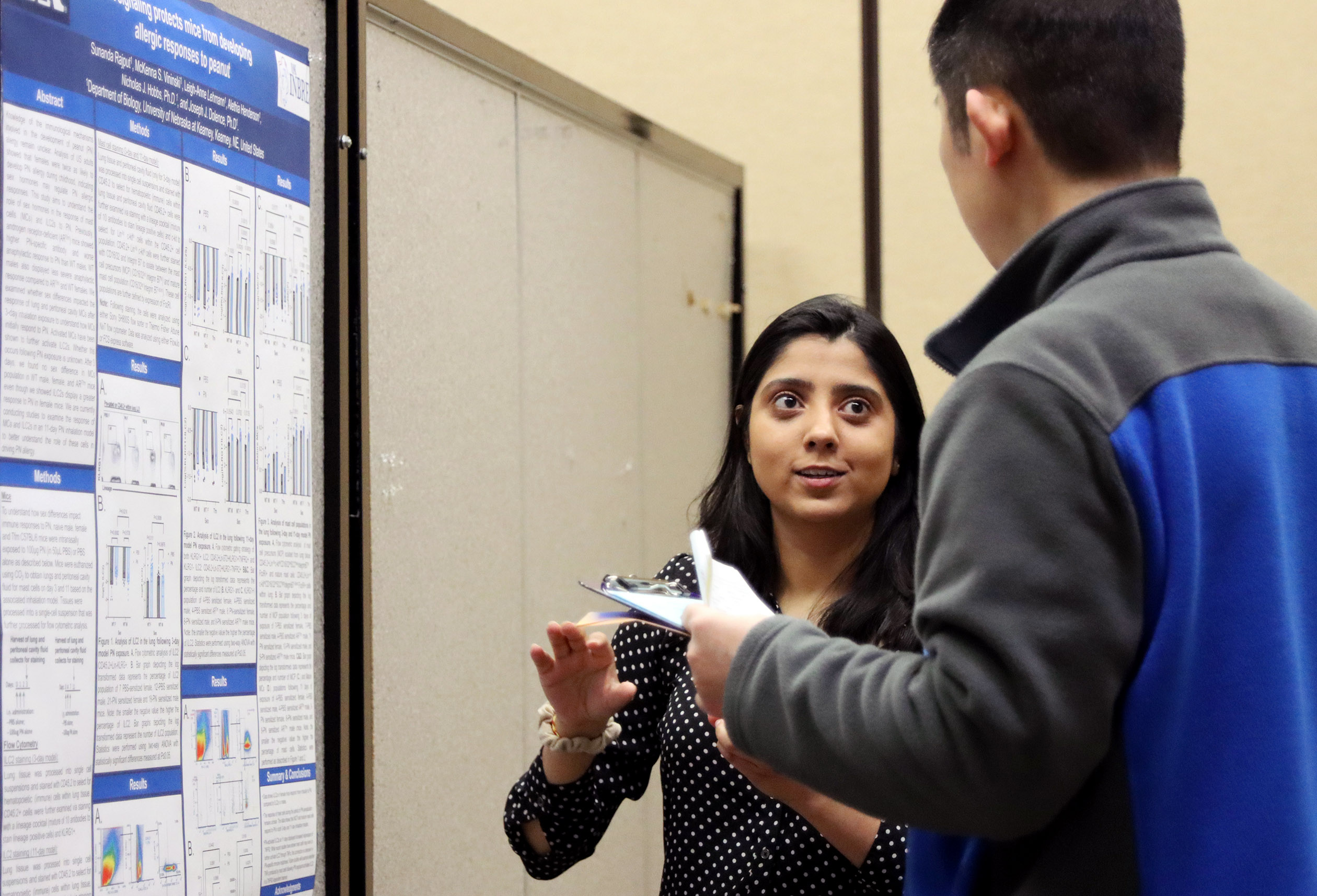 Sunanda Rajput discusses her peanut allergy research during UNK Student Research Day. 