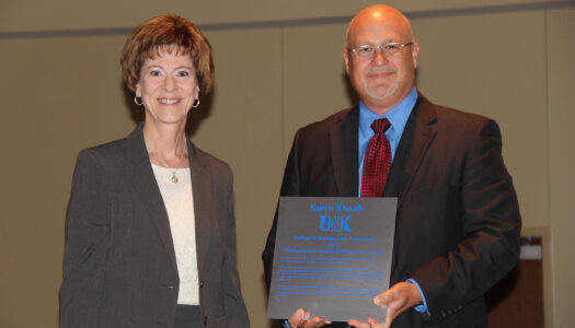 Tim Burkink is pictured with College of Business and Technology Distinguished Alumni Achievement Award recipient Karen Rhoads in 2015.