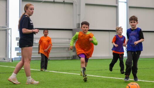 UNK soccer player Sarah Levy oversees a game during TOPSoccer.
