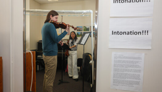 Music Professor Ting-Lan Chen teaches violin in her office (Photo by Erika Pritchard, UNK Communications).