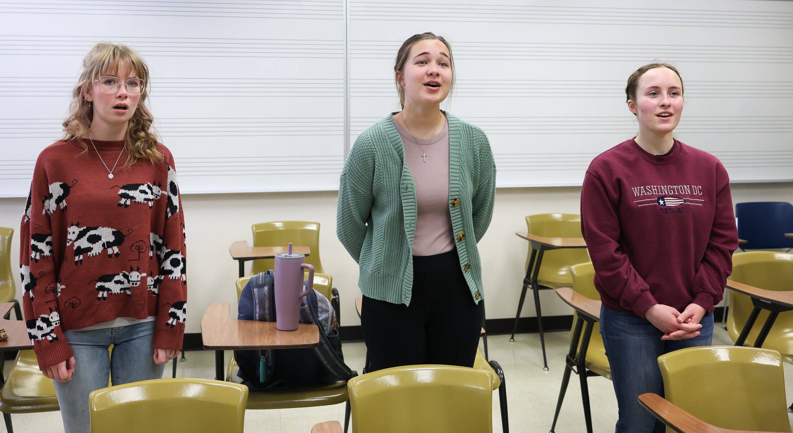 Students practice singing.