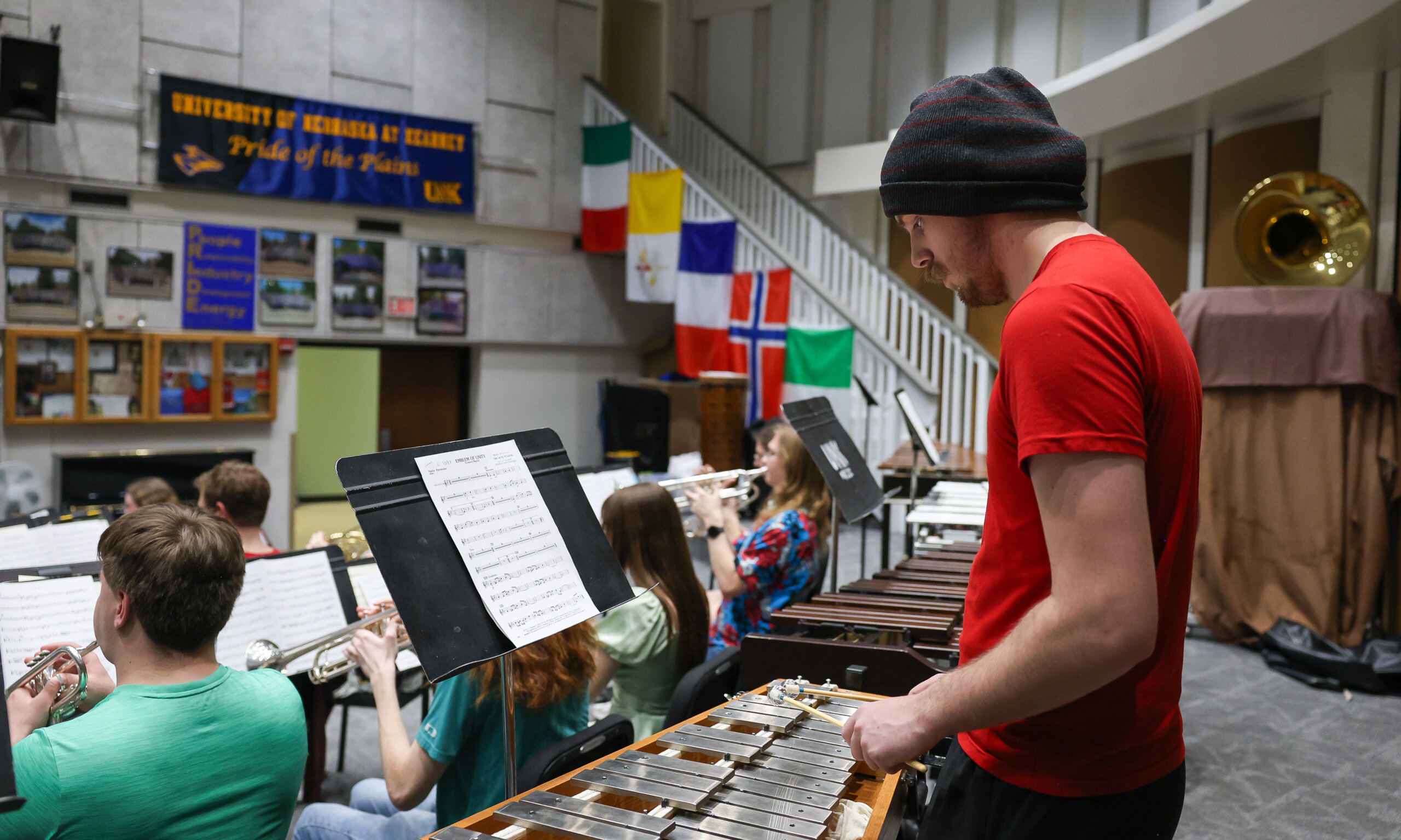 Students play musical instruments.