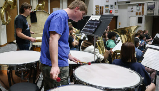 Wind Ensemble band members practice a musical piece (Photo by Erika Pritchard, UNK Communications).