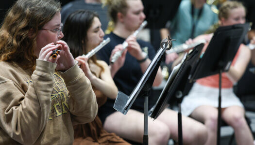 Wind Ensemble band members practice a musical piece (Photo by Erika Pritchard, UNK Communications).