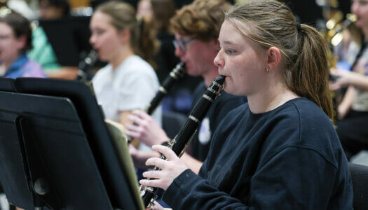 Wind Ensemble band members practice a musical piece (Photo by Erika Pritchard, UNK Communications).
