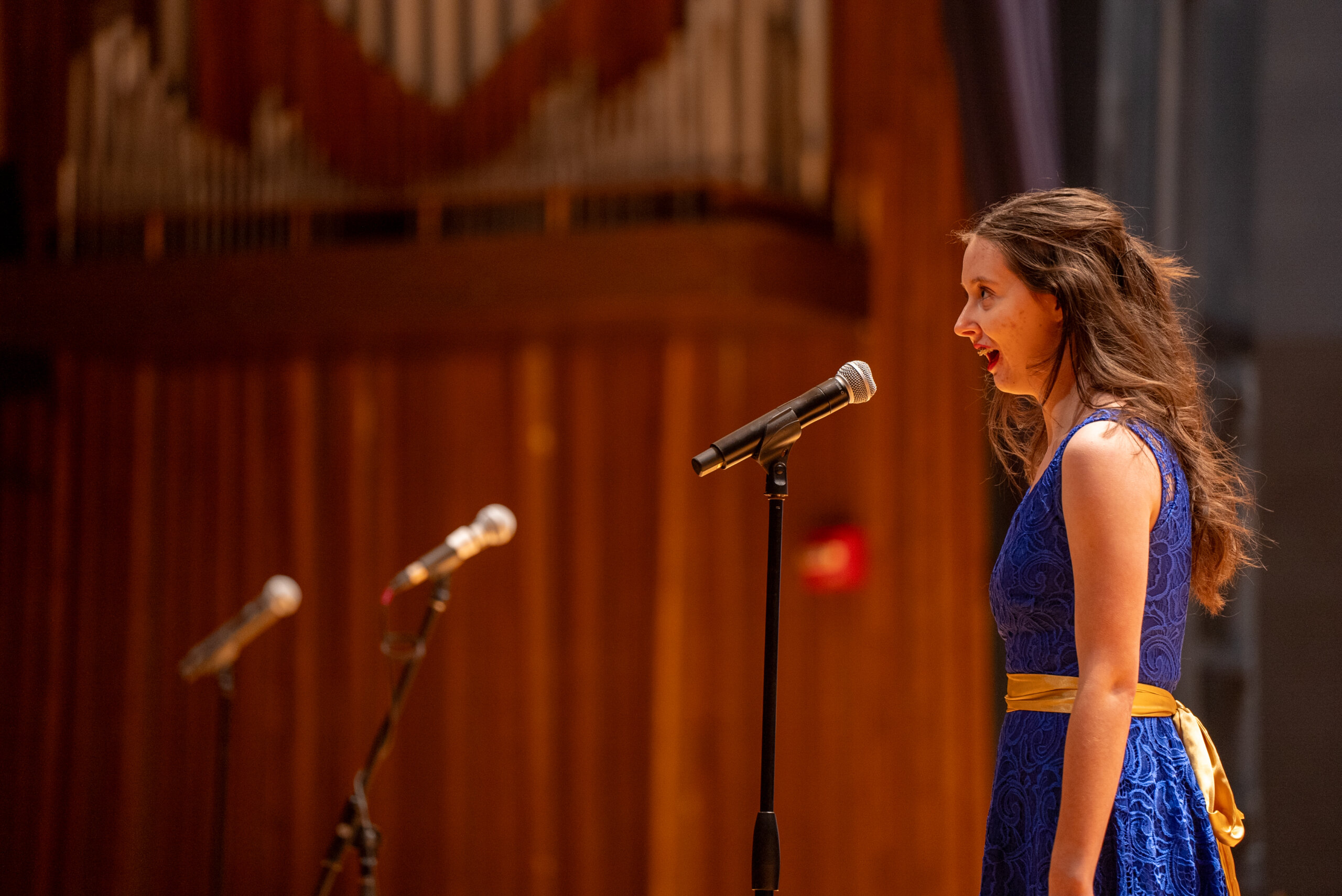 A girl sings.