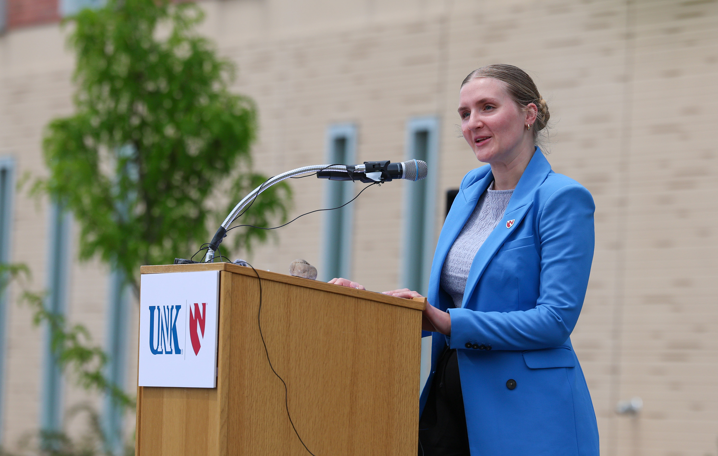 UNMC Student Regent Allie Daro speaks Thursday during a dedication ceremony at the Douglas A. Kristensen Rural Health Education Complex in Kearney.