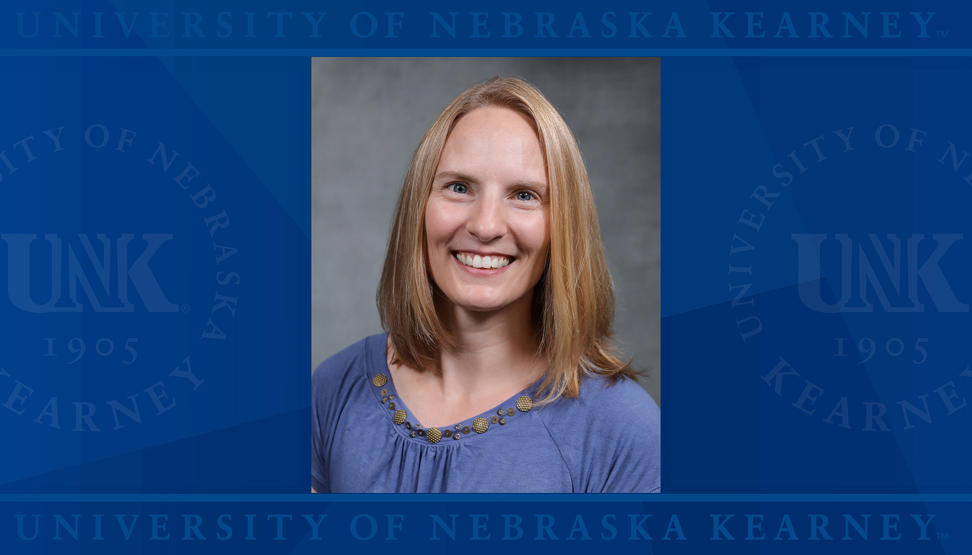 Annette Moser headshot over UNK background