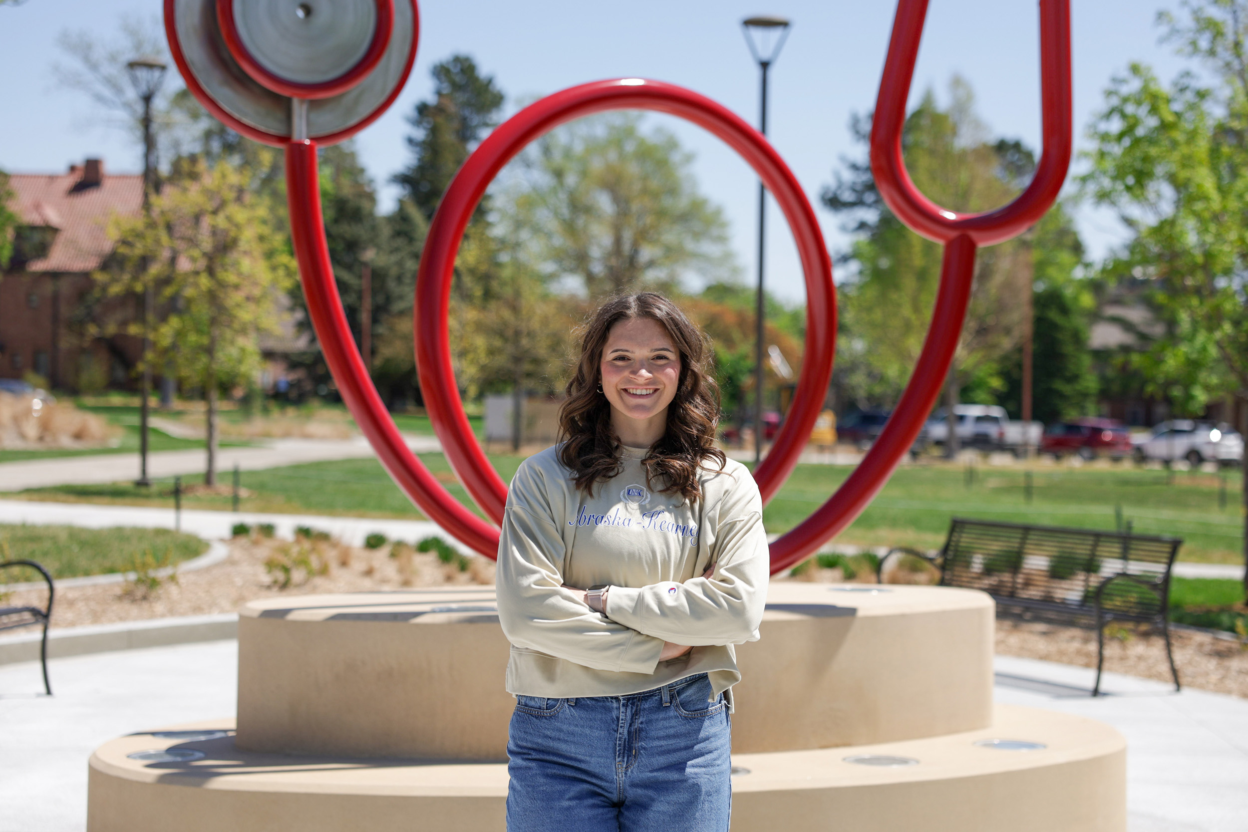 Elly Piper poses for a photo outside the Health Science Education Center II on the UNK campus.