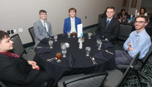 FSL awards banquet attendees pose for a photo.