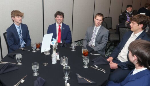 FSL awards banquet attendees pose for a photo.