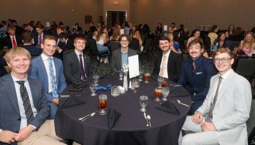 FSL awards banquet attendees pose for a photo.
