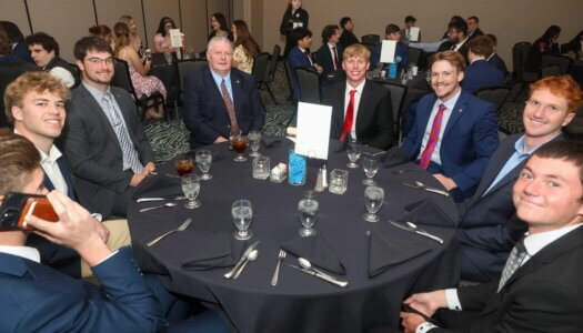 FSL awards banquet attendees pose for a photo.