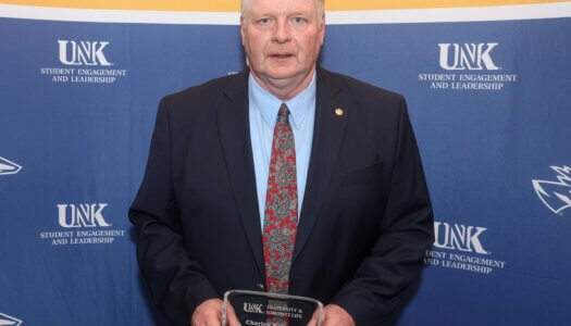 Charles McGraw receives the Fraternity Advisor of the Year Award.