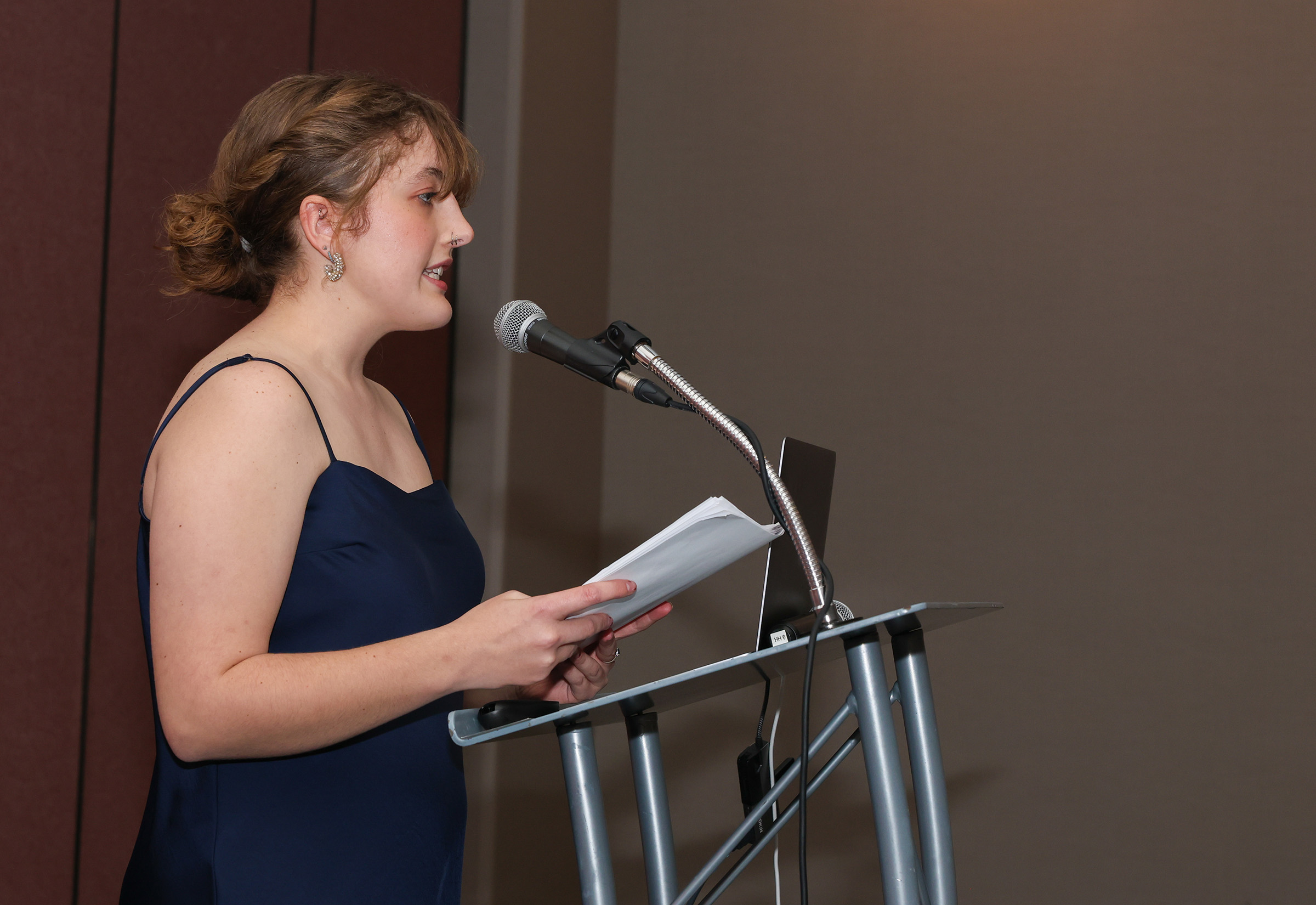 Kailey Wilcox speaks during a UNK Fraternity and Sorority Life event.