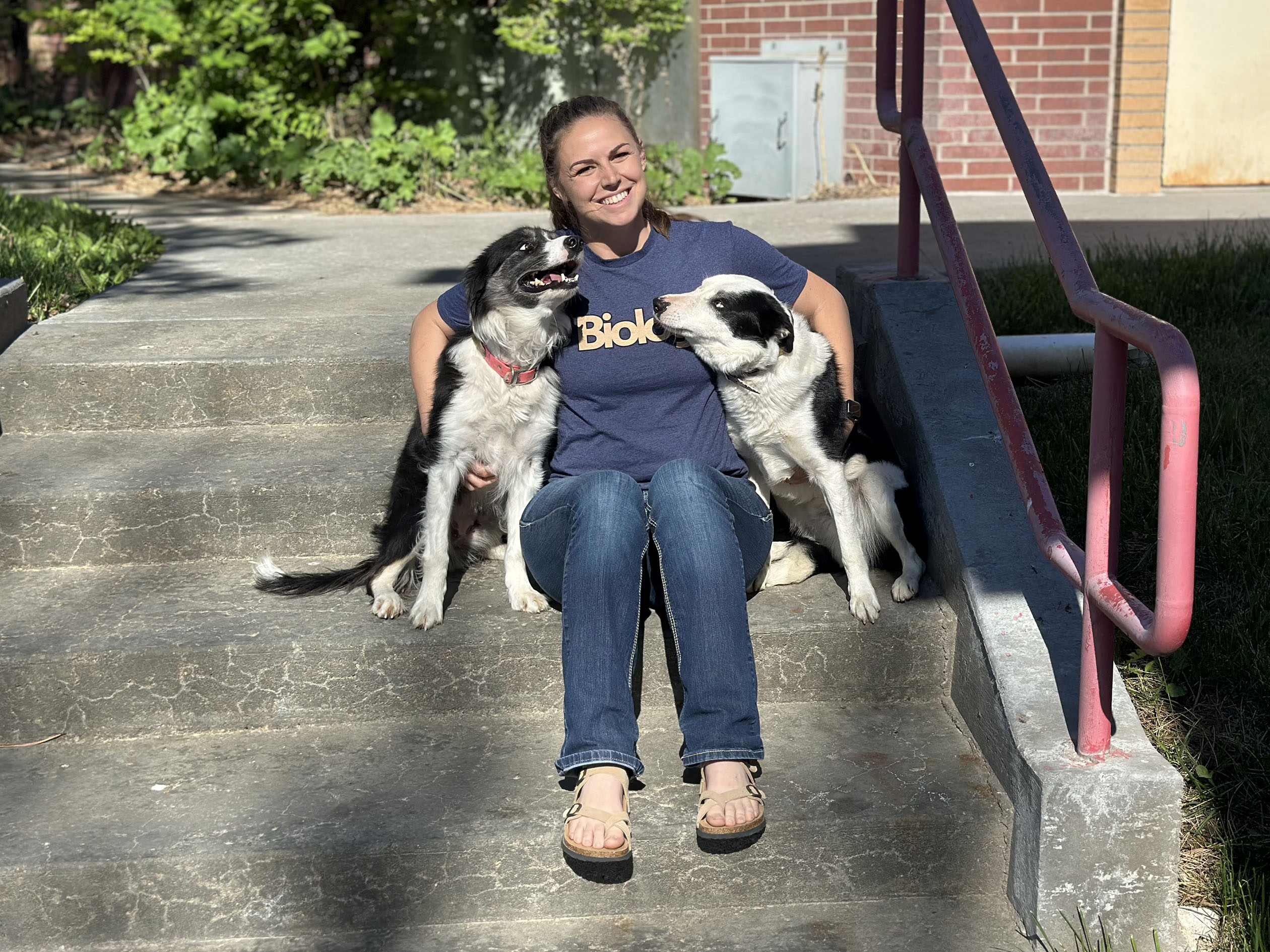 Leighlynn Towne is pictured with two of her dogs.