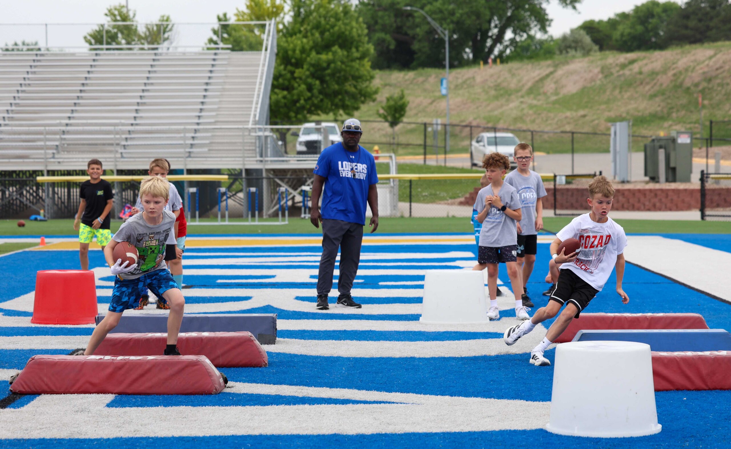 The Little Lopers youth football camp at Cope Stadium.