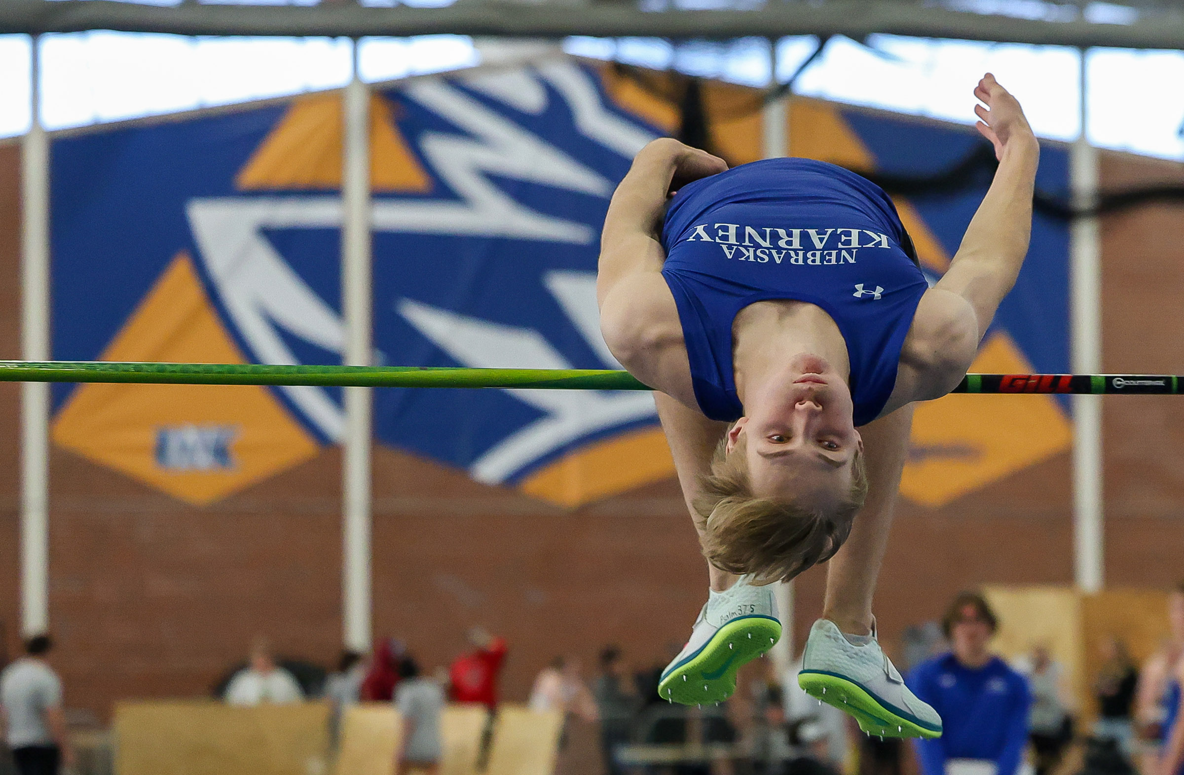 Luke Brachle clears the bar during a meet at Cushing Coliseum on campus.