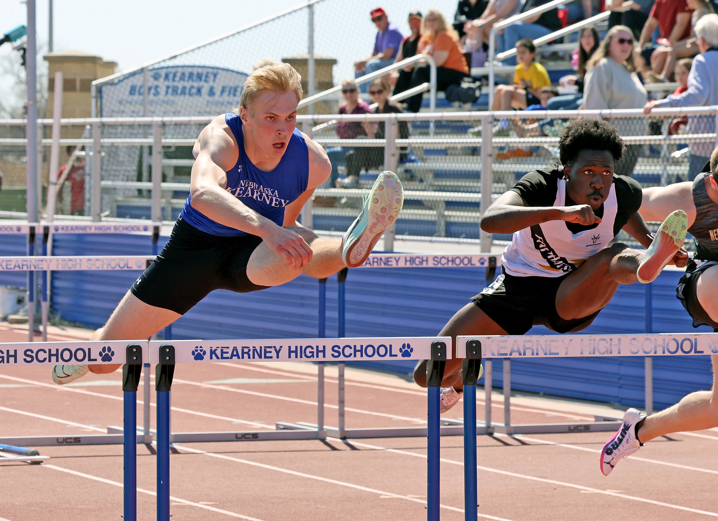Luke Brachle competes in the 110-meter hurdles.