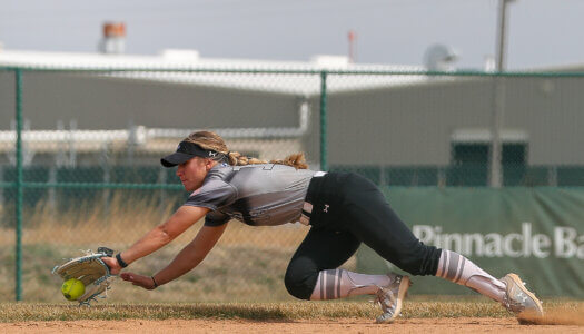 Mary Chvatal fields a grounder.