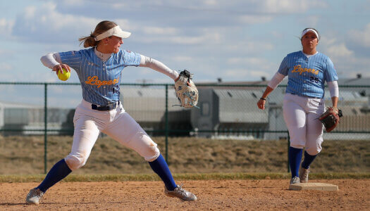 Mary Chvatal throws to first.